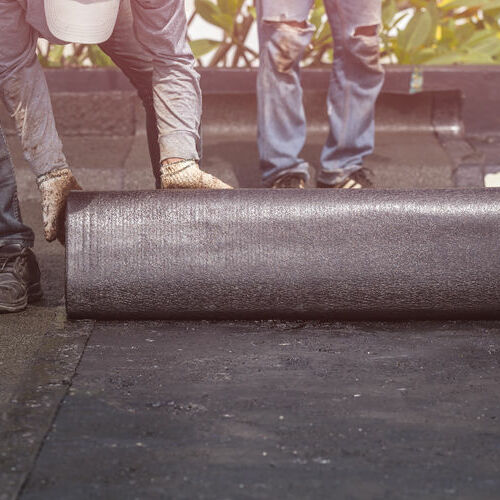 Roofers Install a Modified Bitumen Roof