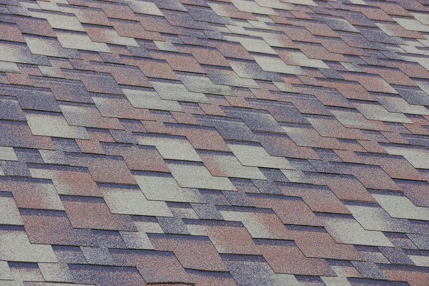 gray brown tile texture on the roof of the building